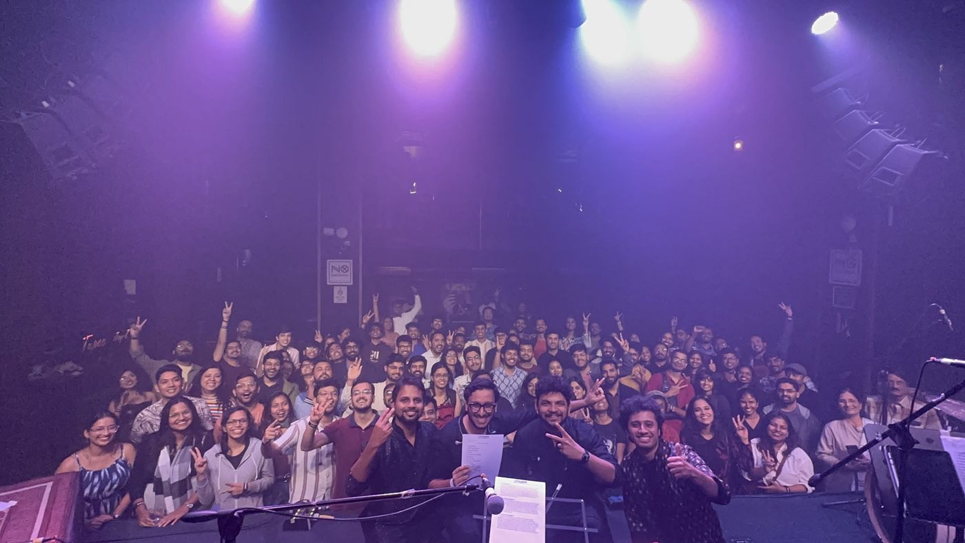 A packed crowd in front of the stage
